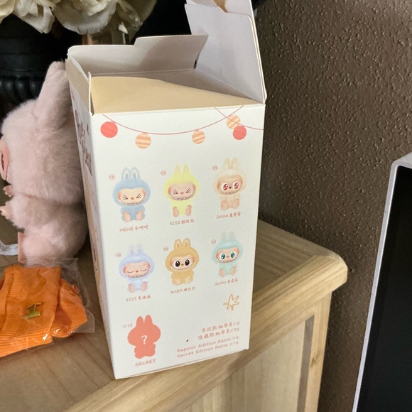 Coach Blush Butterfly Rivets Corner Zip Wristlet plus a Pop Mart lil’ Monster - Picture 14 of 15